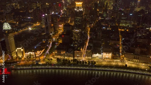 China Shanghai Aerial v39 Hyperlapse birdseye night view of Huangpu riverfront following path 10/18 photo