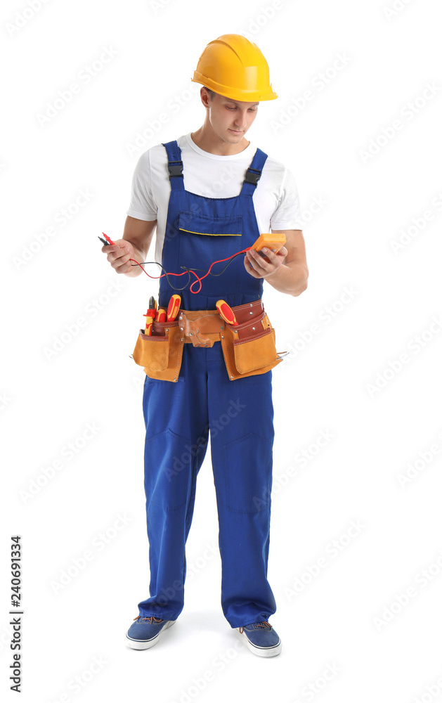 Electrician with multimeter wearing uniform on white background