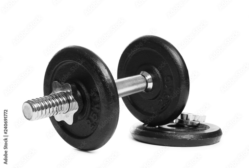 Professional dumbbell and weight plate on white background. Sporting equipment Professional dumbbell and weight plate on white background. Sporting equipment