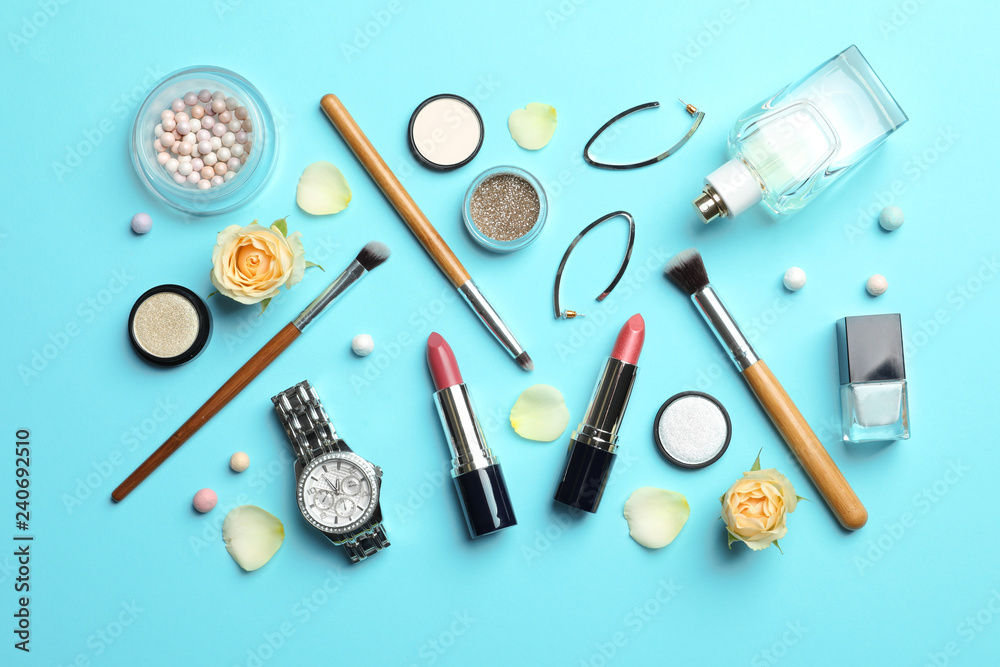 Flat lay composition with lipstick on color background