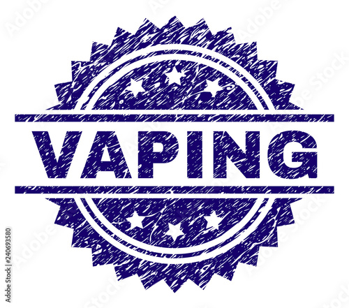 VAPING stamp seal watermark with distress style. Blue vector rubber print of VAPING caption with dirty texture.