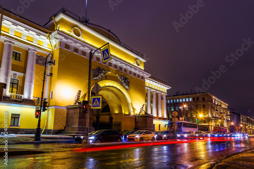 Night cityscape with traffic lights, car's light, the admitalty building and palace embankment. Saint Petersburg Russia photo