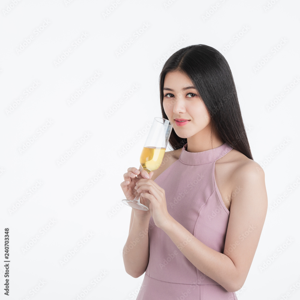 Attractive girl in pink with her drink at party. Attractive girl in pink with her drink at party.