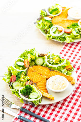 Grilled salmon meat steak with fresh vegetable
