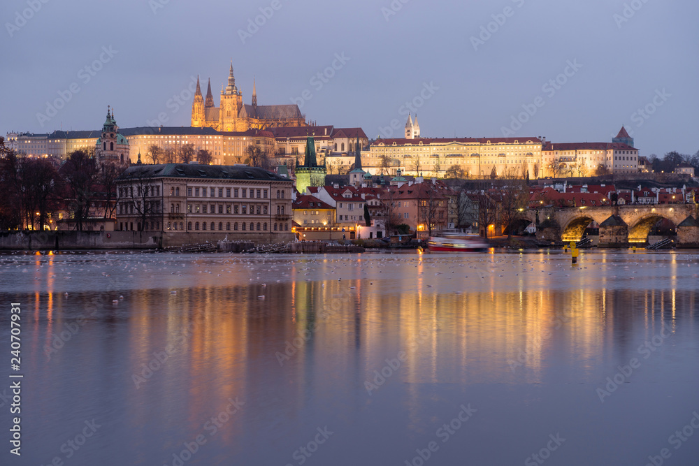 Prague castle in Hradcany with Vltava river at dusk. Famous tourist destination in Prague, Czech republic