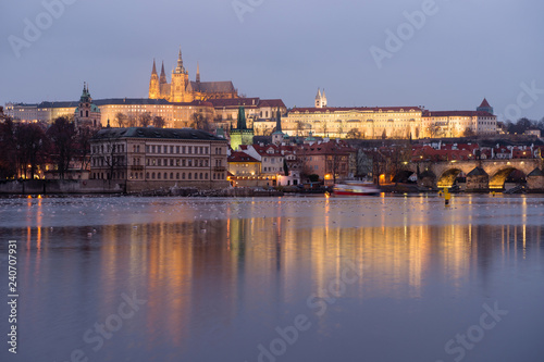 Prague castle in Hradcany with Vltava river at dusk. Famous tourist destination in Prague, Czech republic