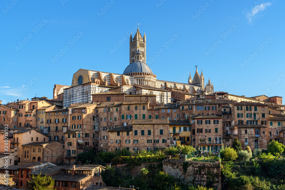 View on Siena with Dome and Bell Tower of Siena Cathedral or Duomo di Siena from Basilica di San Domenico. Italy