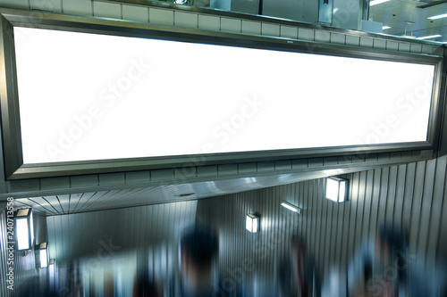 Large blank billboard on escalator in the city