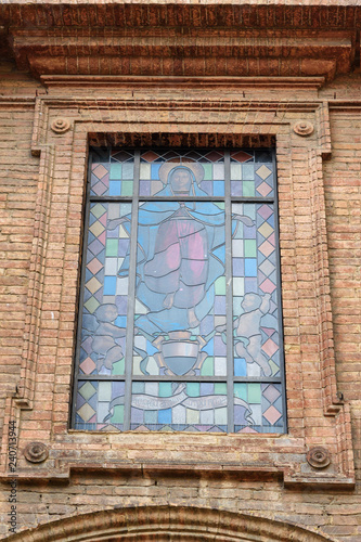 stained glass window of Chiesa di San Cristoforo is church located on Piazza Tolomei. Siena. Italy photo