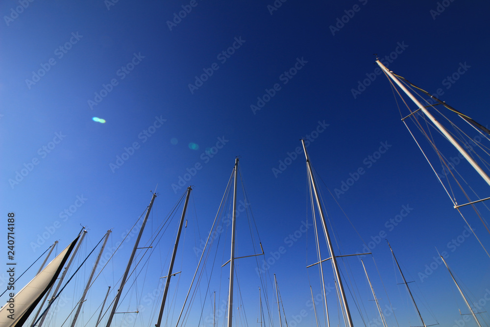 Abstract scenery of the clear blue sky that imaged the summer and the mast of the yacht Abstract scenery of the clear blue sky that imaged the summer and the mast of the yacht