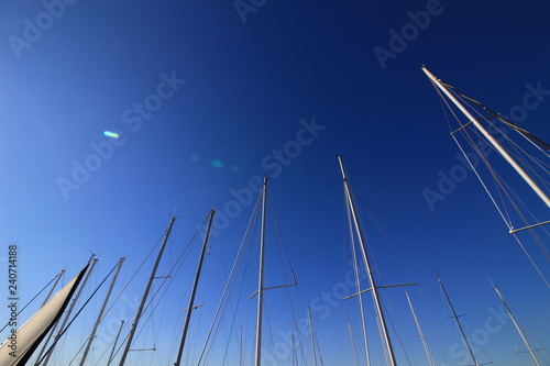 Abstract scenery of the clear blue sky that imaged the summer and the mast of the yacht