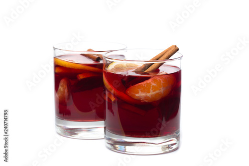 mulled wine with spices isolated on white background