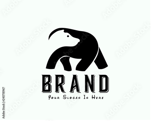 Walking bear head negative space on body logo design inspiration