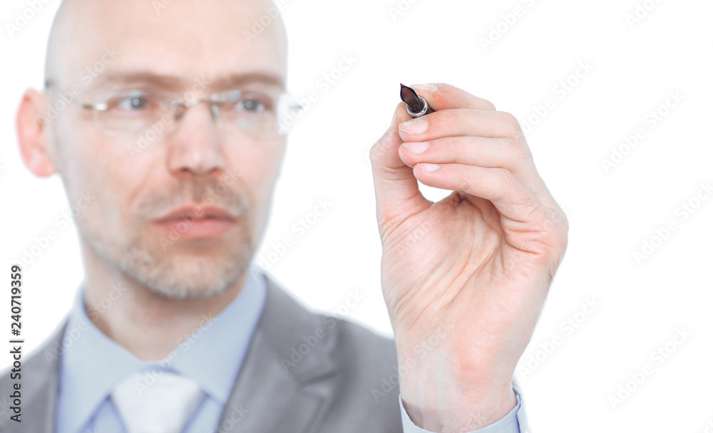 Young businessman makes a record. Isolated on a white background. Young businessman makes a record. Isolated on a white background.