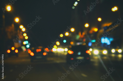 Defocused image of night traffic in the city