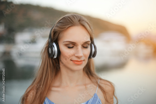 young woman listening to music