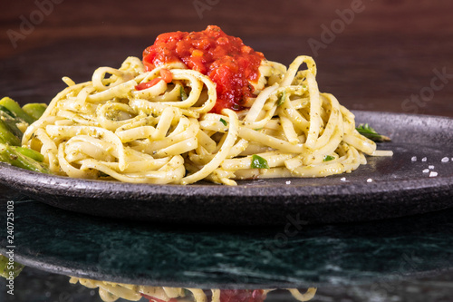 Italian paste made from whole grains of durum wheat. Tomato sauce with meat and vegetables.