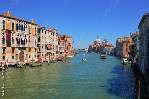 Venetian canal detail with small boat in summer © Adonyi