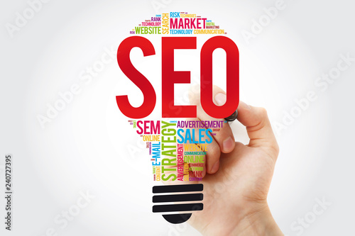 SEO (search engine optimization) bulb word cloud with marker, business concept