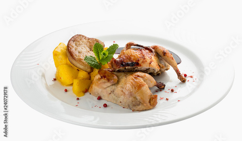 Quail with berry sauce. On white background