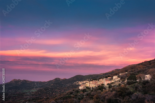 Sunset over mountain villages in Corsica