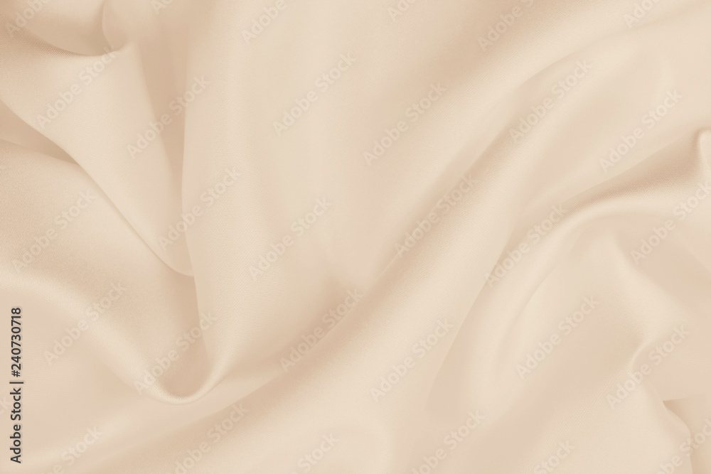 Fototapeta premium Smooth elegant golden silk or satin luxury cloth texture as wedding background. Luxurious background design. In Sepia toned. Retro style