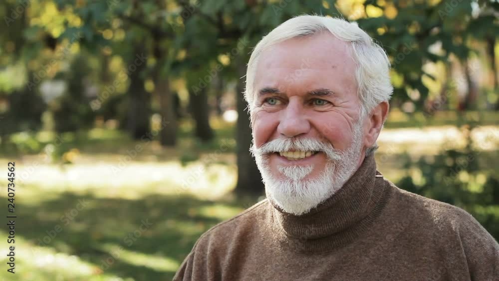Funny, charismatic, gray-bearded guy getting ready for date, luxurious moustache