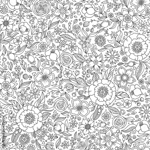 Seamless floral doodle background pattern in vector. © photo-nuke