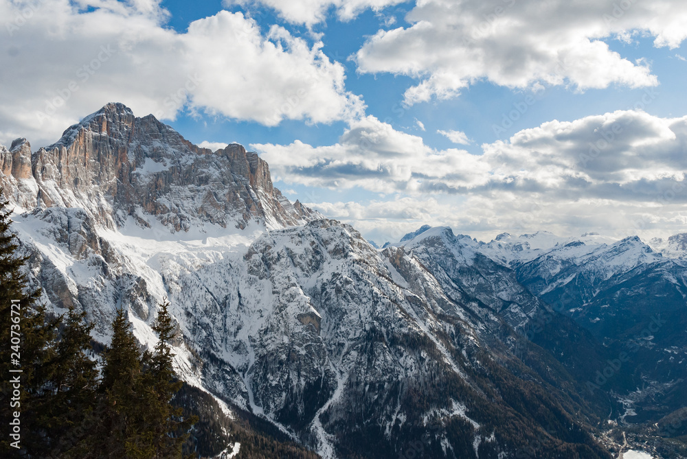 Dolomites Italy winter mountain panorama snow rock valley