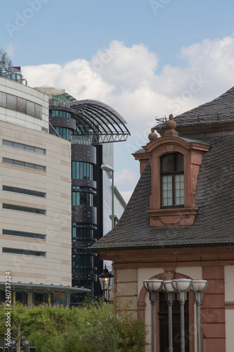 contrast between old and new buidings in a city