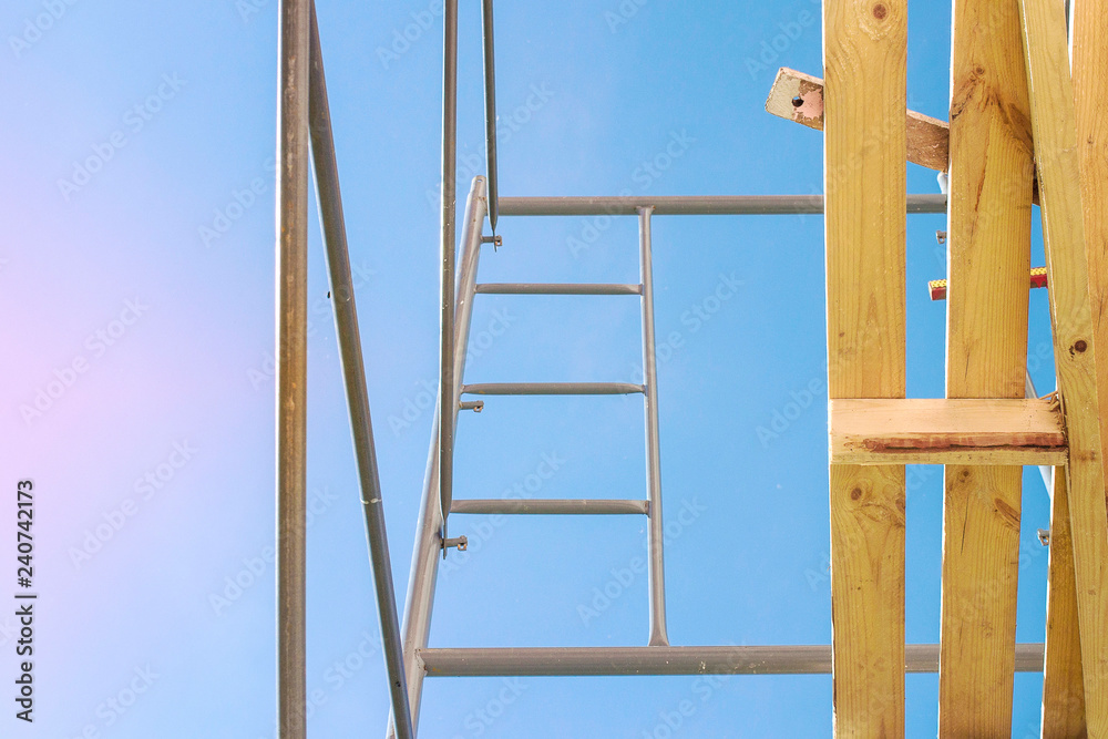 scaffolding on blue sky background scaffolding on blue sky background