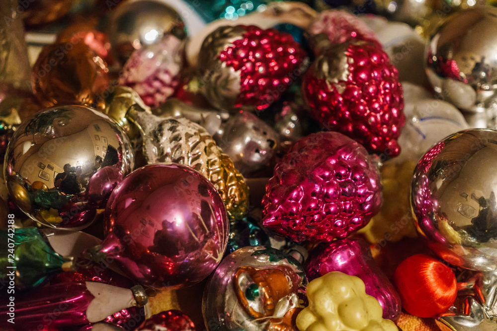 Different colorful Christmas toys ,golden fish, stars, cones. New year.Christmas background.Seventies of the last century Different colorful Christmas toys ,golden fish, stars, cones. New year.Christmas background.Seventies of the last century