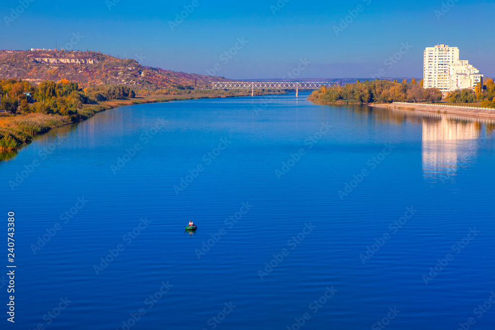 landscape with flowing blue river 