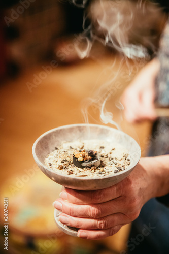 Traditional (esoteric) incense ritual at Sylvester and Christmas, smoke photo