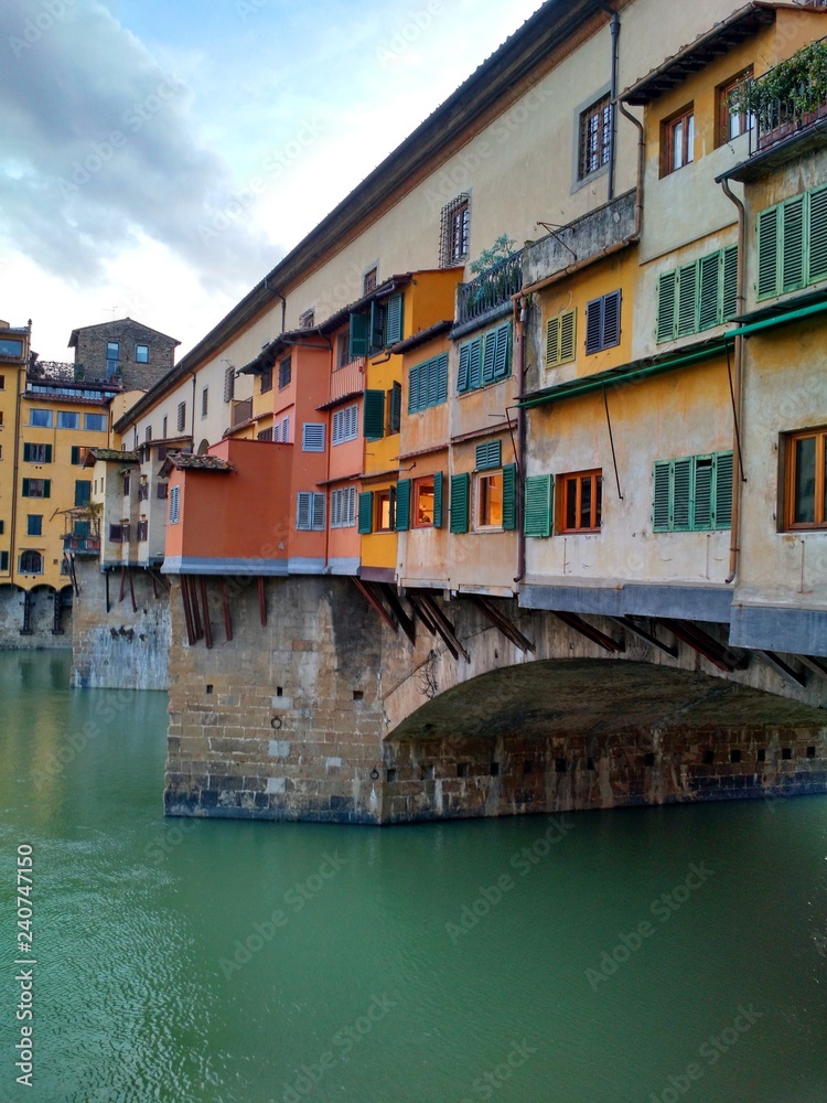 View of the colorful western side of Ponte Vecchio, Florence, Italy