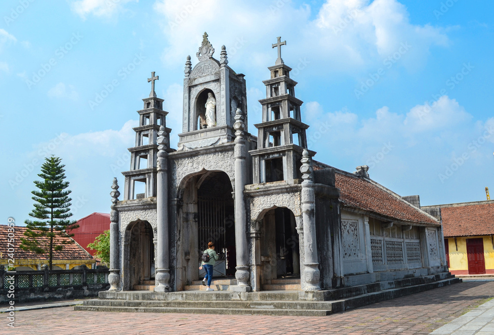 Phat Diem Stone Cathedral, Phat Diem church is a cross between Vietnamese and European styles, It took 24 years to build this church from 1875 to 1898.