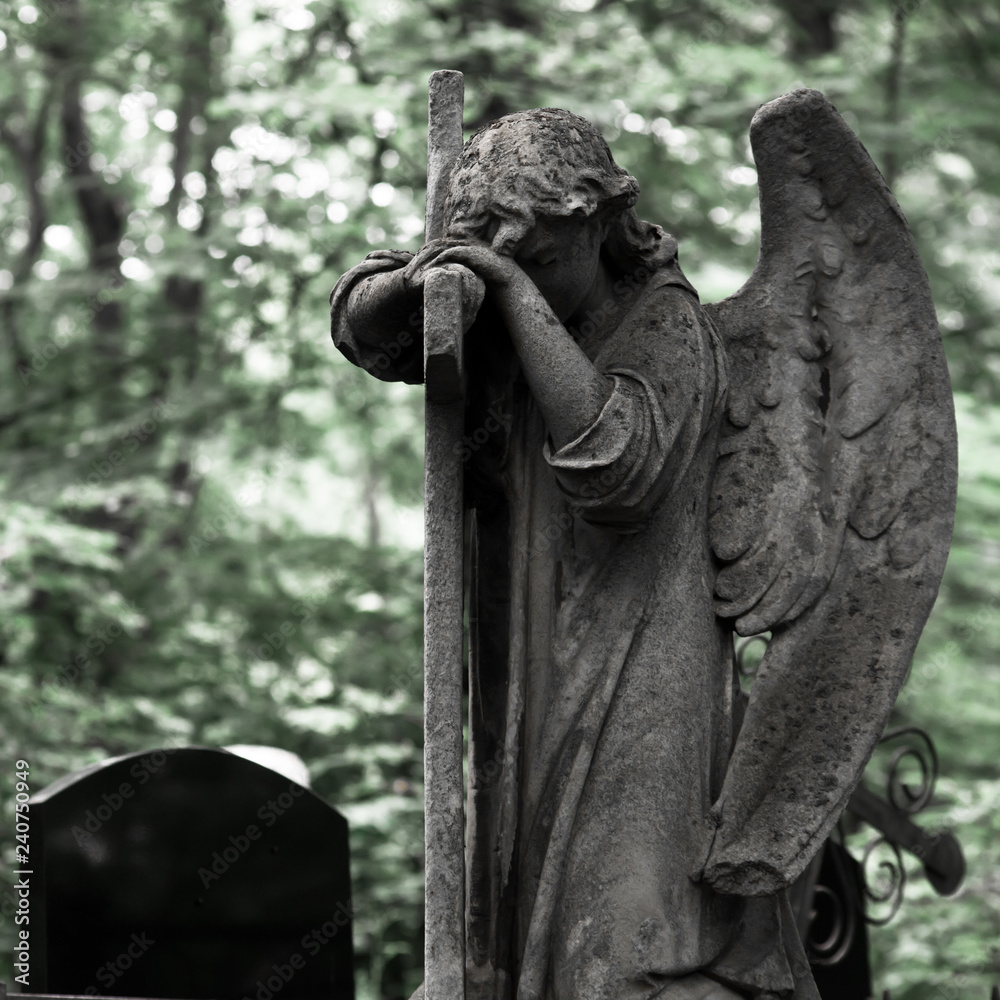 The Sorrowful Angel. Weeping angel with a cross, space for text Stock Photo  | Adobe Stock