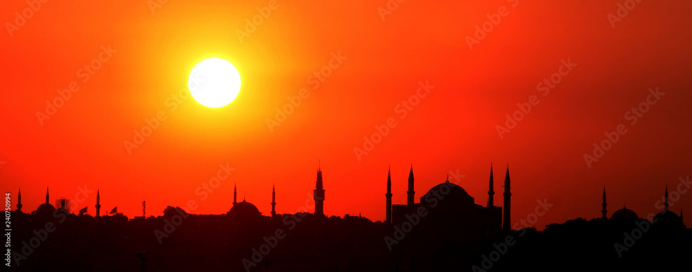 During the sunset historical peninsula and Hagia Sofia, Istanbul, Turkey. This picture was taken from the Kadikoy District.