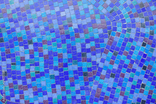Detail of a beautiful crumbling abstract ceramic mosaic decoration. Background and texture