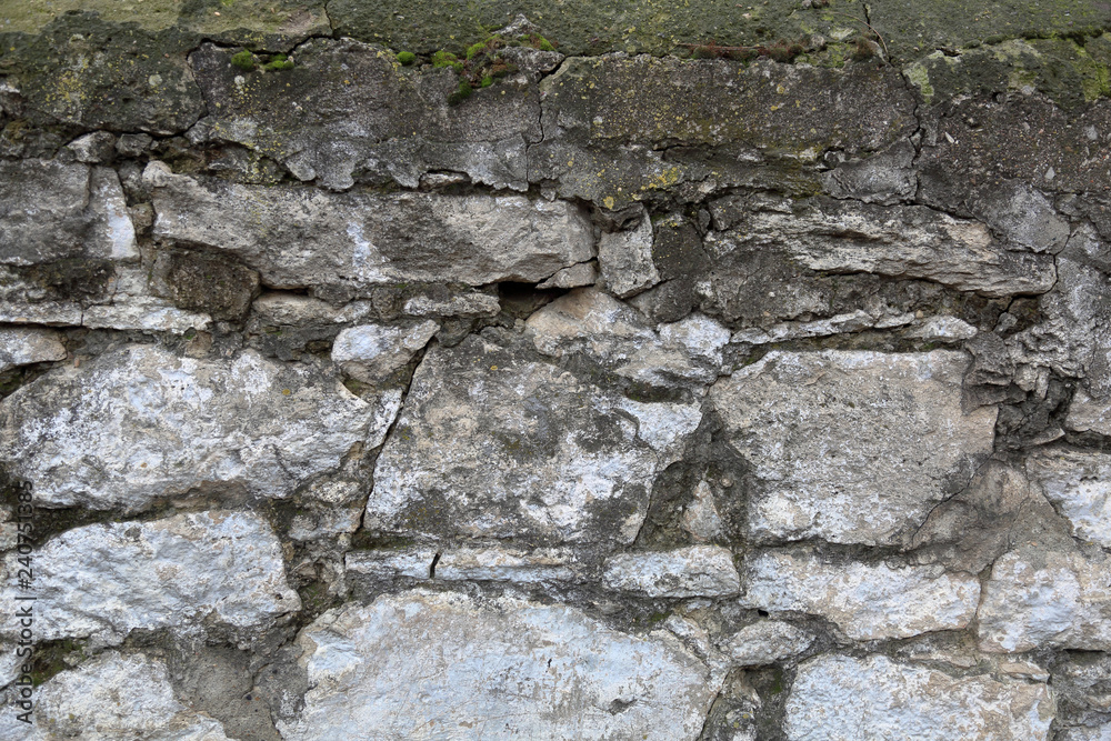 Original textured surface of of a natural coarse stone Original textured surface of of a natural coarse stone