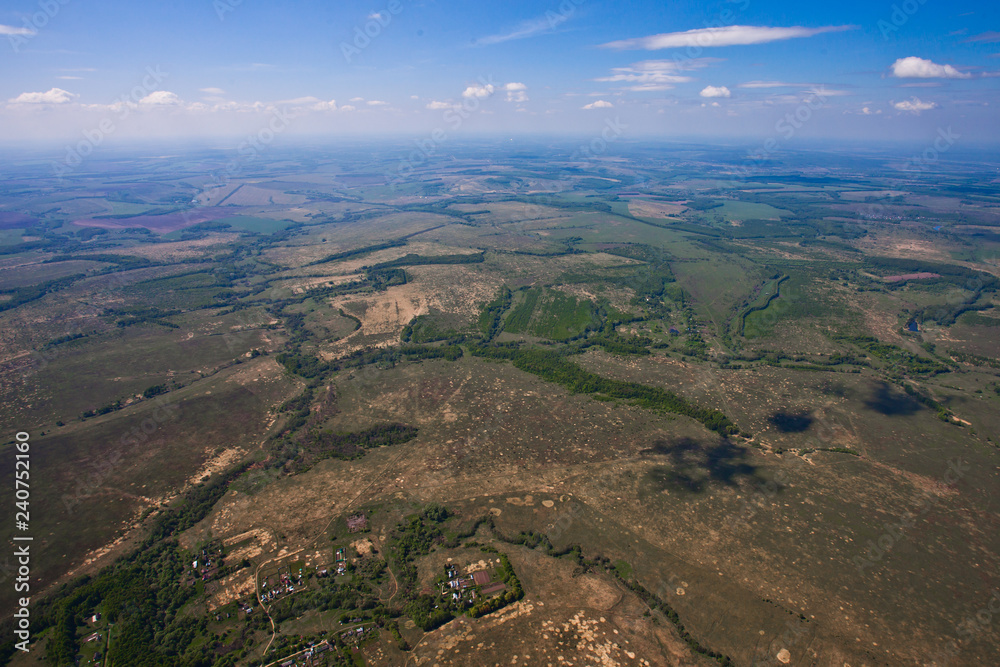 Flight over the plain with rivers, fields and forests. Flight over the plain with rivers, fields and forests.