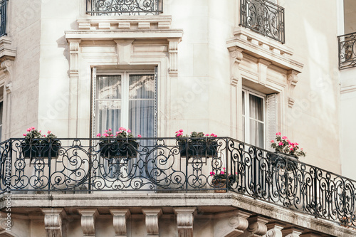 View from below on a facade European building with balconies in Paris, France Fototapeta