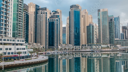 View of Dubai Marina Towers in Dubai at morning time timelapse