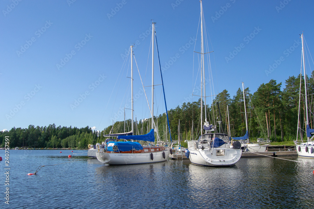 Landscape of a lake with boats in Kuopio