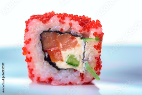 Roll sushi closeup on a light background.