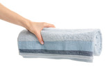 Blue towel roll in hand on white bckground isolation