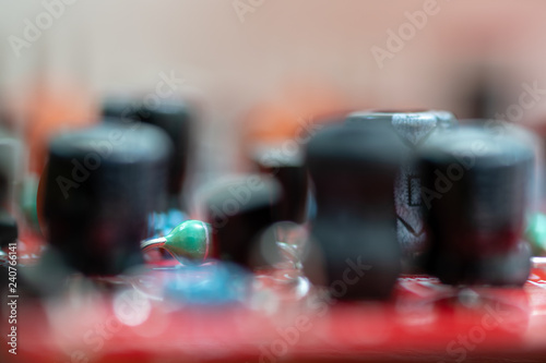 Close up (Macro) of Printed Circuit Board PCB embedded components (inductors, resistors, capacitors, diodes, microchips, transistor) with short depth of view