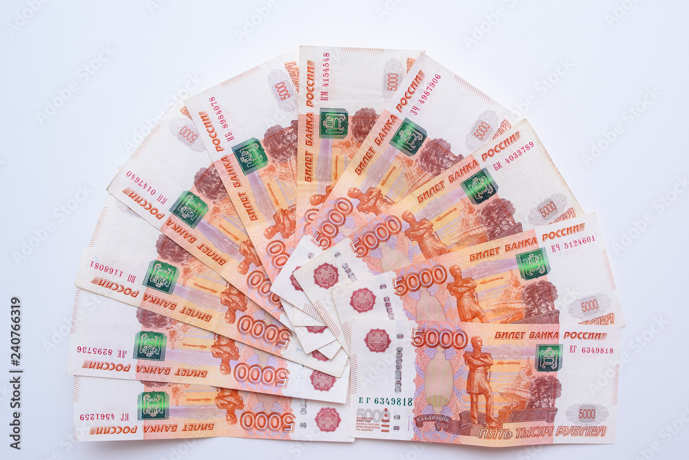 Five thousand rubles bill. Russian rubles. a bunch of 5000 Russian banknotes close up. Russian paper currency. Five thousand rubles bill. Russian rubles. a bunch of 5000 Russian banknotes close up. Russian paper currency.