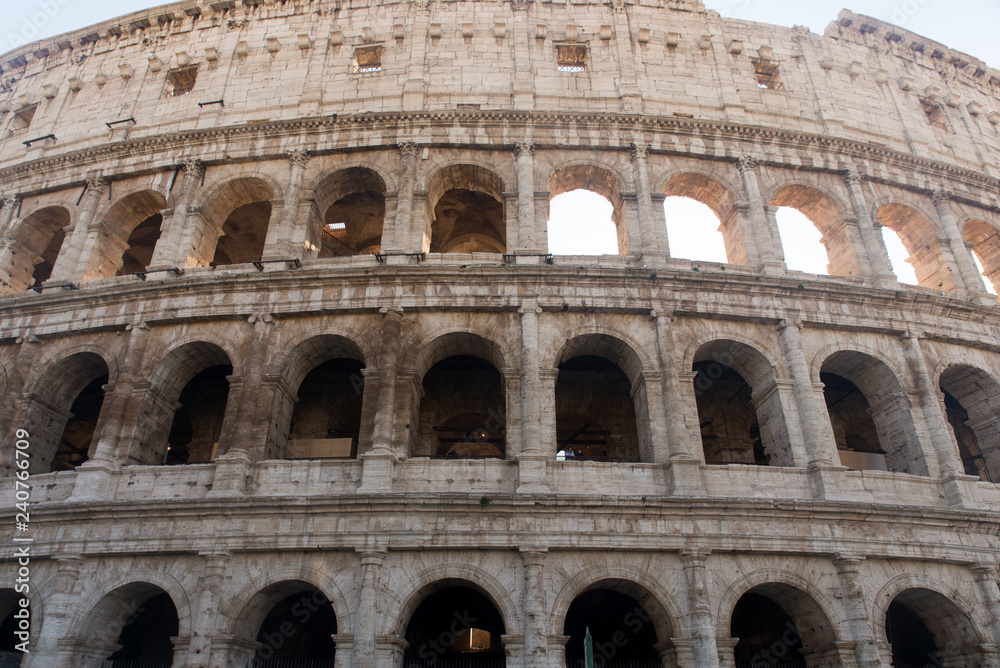Colosseum, Rome, Italy - November 23 2017: Rome ancient arena of gladiatorial fights. It is the best-known monument in Italy,