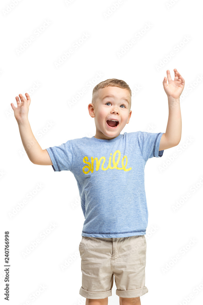 Full length portrait of cute little kid boy in stylish clothes standing against white studio wall. Kids fashion concept Full length portrait of cute little kid boy in stylish clothes standing against white studio wall. Kids fashion concept